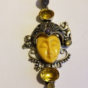 Intricately carved pendant